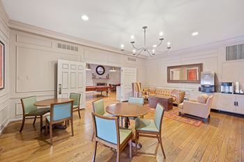 a living room with a table and chairs and a kitchen at Indian Creek Apartments*, Cincinnati, 45236